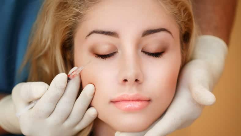 Woman getting Botox and dermal fillers