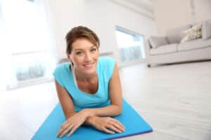 Beautiful woman gets back to her yoga routine shortly after a cosmetic procedure in Cleveland.