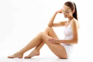 Woman no longer has spider veins on her legs after sclerotherapy.
