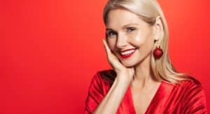 Middle aged woman has fresh face and gorgeous skin with AquaGold microneedling facial.